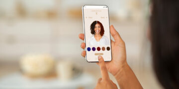 Augmented Reality Beauty App. Woman Trying Different Hair Color Online